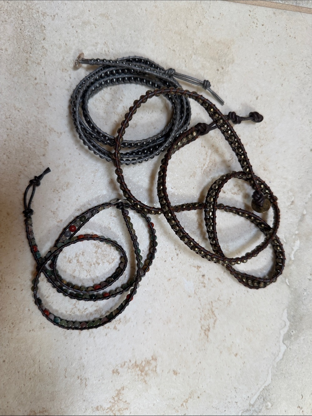 Three Wrap Bracelets in Brown and Gray